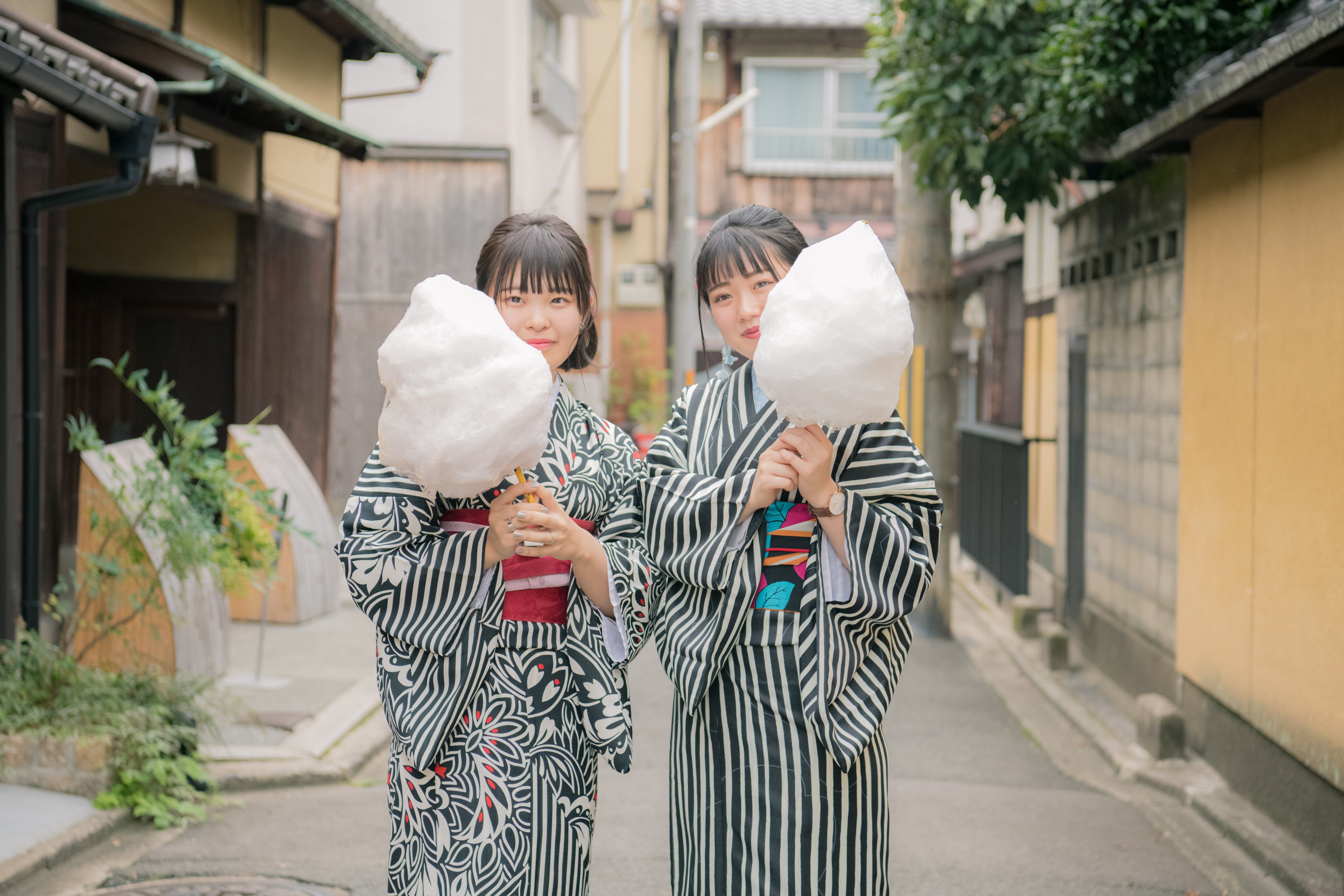 Photo of Women Holding Cotton Candy